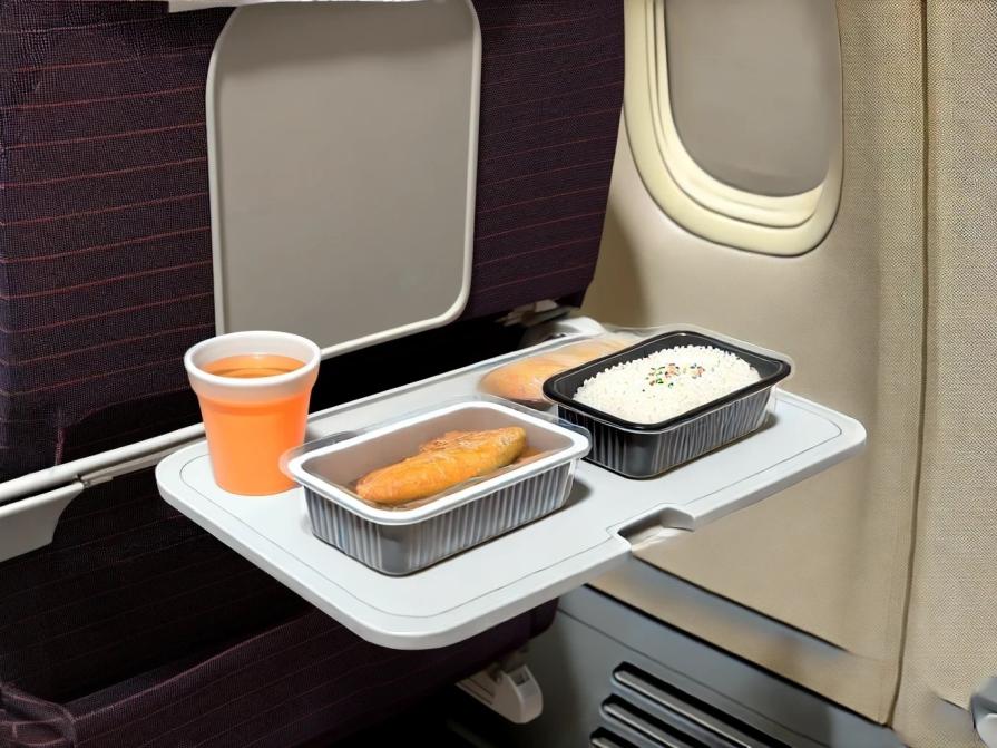 Why does lunch on airplanes always seem tasteless?